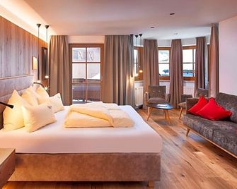 Bauernhof Hotel Oberschwarzach - Hinterglemm - غرفة نوم