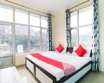 Hotel O Rishika Guest House - Dharamshala - Habitación