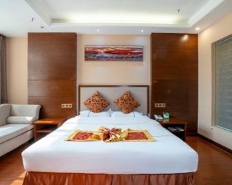 Tianshuiwan Hotel - Chizhou - Schlafzimmer