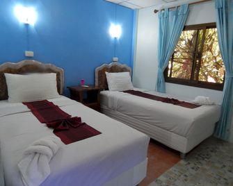 Thai Garden Inn Kanchanaburi - קאנצ'אנאבורי - חדר שינה
