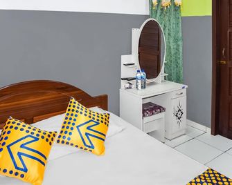 Hotel O Penginapan Widodo - Samarinda - Ložnice
