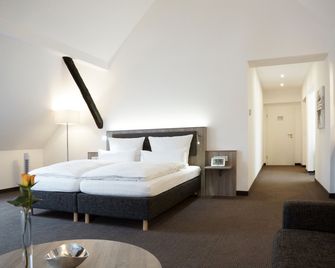 Hünerbein's Posthotel - Schledehausen - Slaapkamer