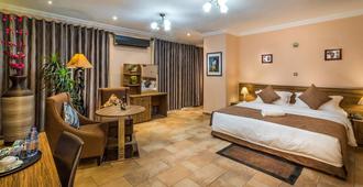 Midindi Hotel - Accra - Slaapkamer