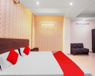 Hotel Om Plaza - Bhópál - Ložnice