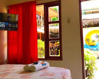 Hostal Tierra y Mar - Montañita (Guayas) - Bedroom