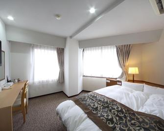 Hotel Keifuku Fukui Ekimae - Fukui - Schlafzimmer
