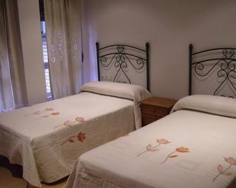 Hotel Delphos - Moraleja - Camera da letto