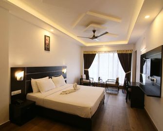 Jays Inn - Munnar - Soveværelse