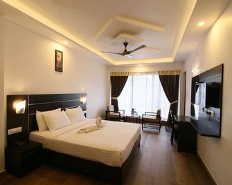 Jays Inn - Munnar - Bedroom