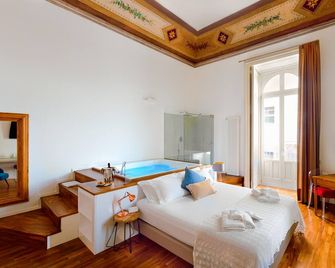 Naca Suite - Catania - Camera da letto