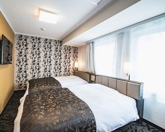 Apa Hotel Sapporo-Susukino-Ekiminami - Sapporo - Bedroom