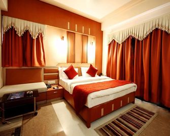 Marshall The Hotel - Ahmedabad - Slaapkamer