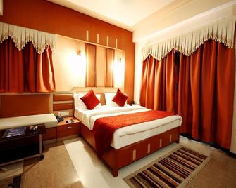 Marshall The Hotel - أحمد أباد - غرفة نوم