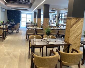 D'more Kuakata Hotel & Resort - Kuakāta - Restaurant