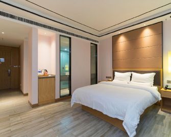 Xingcheng Hotel (Heyuan Railway Station Branch) - Heyuan - Camera da letto