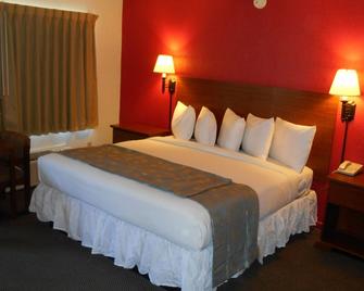 Econo Lodge Inn & Suites - Abilene - Yatak Odası