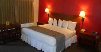 Econo Lodge Inn & Suites - Abilene - Soveværelse
