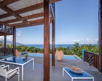 Luxury Caribbean home with pool and spectacular ocean views & Charming Cottage - Calibishie - Balcón