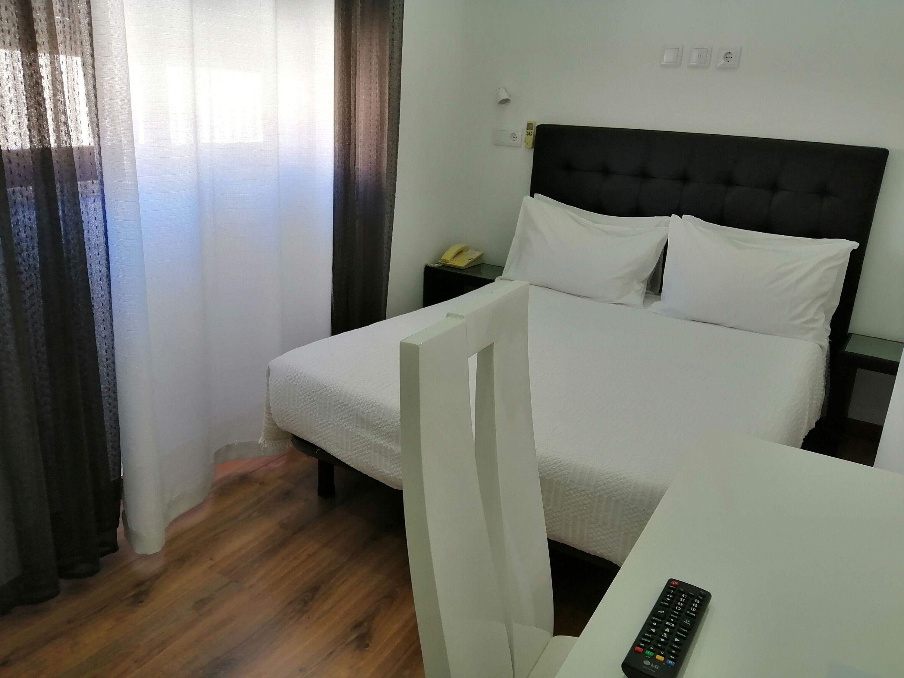 هوتل دوموس - كويمبرا - غرفة نوم