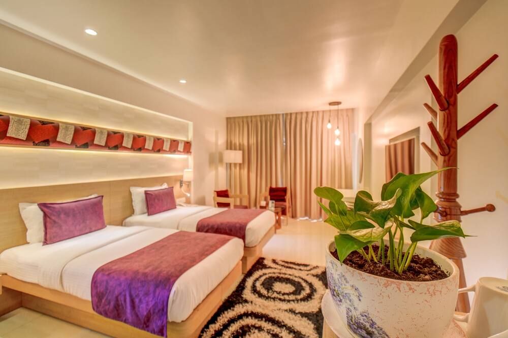 The Ssk Solitaire Hotel & Banquets - Nashik - Camera da letto