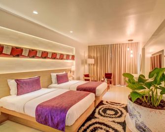 The Ssk Solitaire Hotel & Banquets - Nashik - Camera da letto