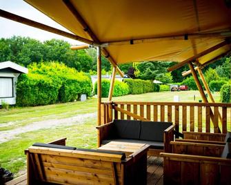 Tent lodge near Loonse and Drunense Duinen - Udenhout - Patio