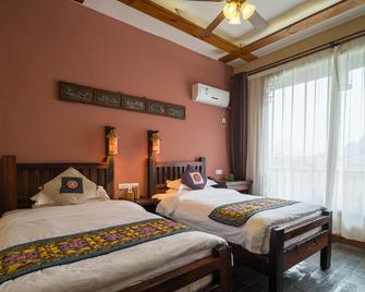 Yangshuo Mountain Nest Boutique Hotel - Guilin - Sovrum