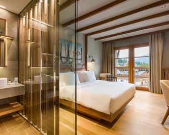 Grand Hotel Savoia - קורטינה ד'אמפצו - חדר שינה