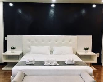 رانغيا هوتل - تاجايتاى - غرفة نوم