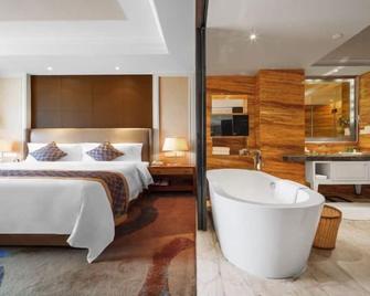 Hohhot Juva Grand Hotel - ฮูฮอต - ห้องนอน