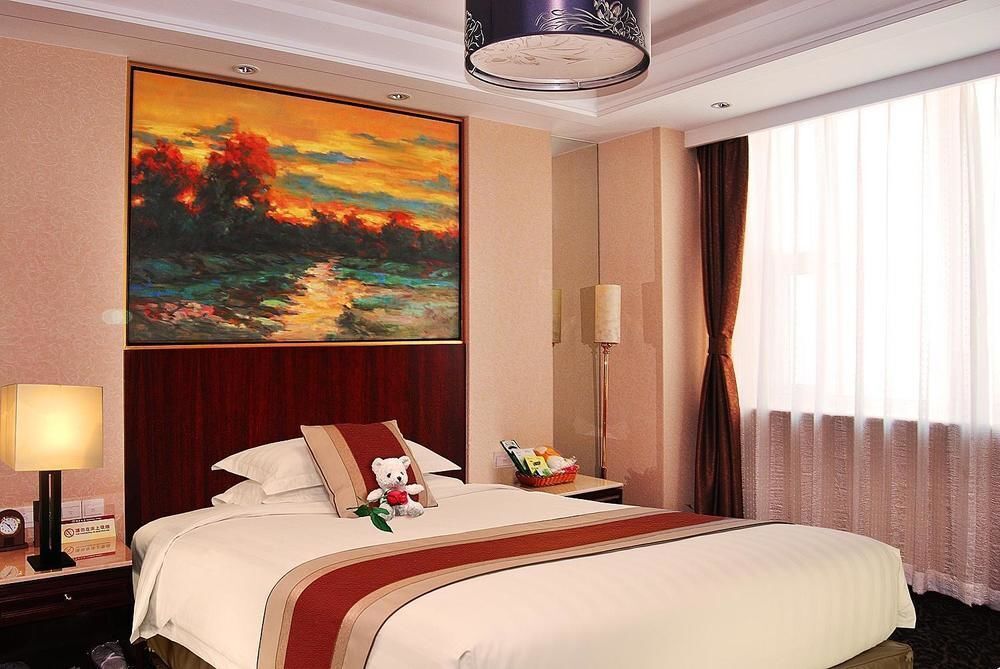 Yizheng Hotel - ז'ינאן - חדר שינה