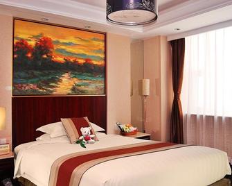 Yizheng Hotel - Jinan - Bedroom