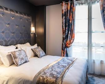 Brit Hotel Privilege Lisieux - La Villa Des Arts - Lisieux - Schlafzimmer