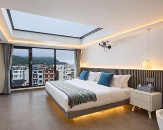 Floral Hotel Shengsi Muye Homestay - Zhoushan - Bedroom