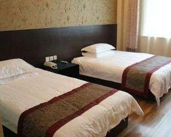 Super 8 by Wyndham Jinan International Airport - Jinan - Habitación