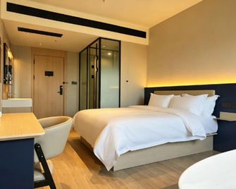7Days Inn Luoyang New District Longmen Avenue Branch - Luoyang - Habitación