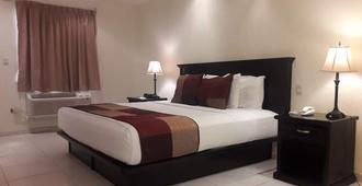 Hotel Quinta San Carlos Inn - Piedras Negras (Zaragoza) - Bedroom
