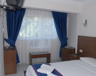 Doruk Hotel & Suits - İçmeler - Habitación