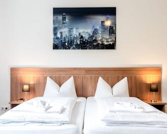 Hotel Fresh Inn - Unterhaching - Slaapkamer