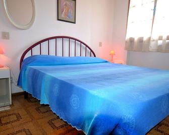 Renovated terraced house with garden and convenient parking space for services - Lido delle Nazioni - Bedroom