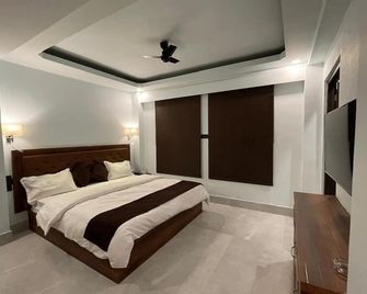 Blue Angel Guest House - Shillong - Schlafzimmer