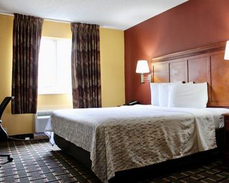 Hometown Inn & Suites - Longview - Bedroom