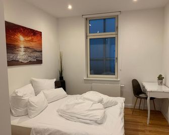 Downtown Apartments Leipzig - לייפציג - חדר שינה