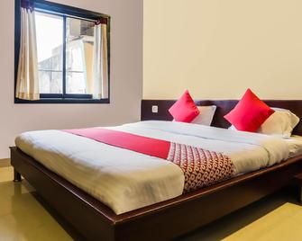 OYO Hotel Bagiya Restaurant - Harda - Bedroom