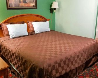 American Inn And Suites Childress - Childress - Bedroom