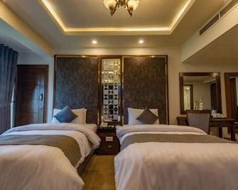Envoy Continental Hotel - Islamabad - Bedroom