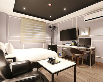Louis Hotel Gangneung - Gangneung - Habitación