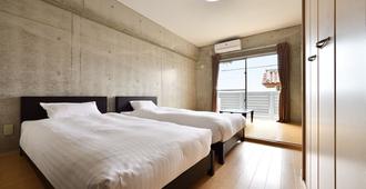 Hotel Resort Inn Ishigakijima - אישיגאקי - חדר שינה