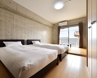 Hotel Resort Inn Ishigakijima - אישיגאקי - חדר שינה