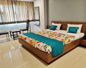 Hotel Dhruva - Solāpur - Habitación